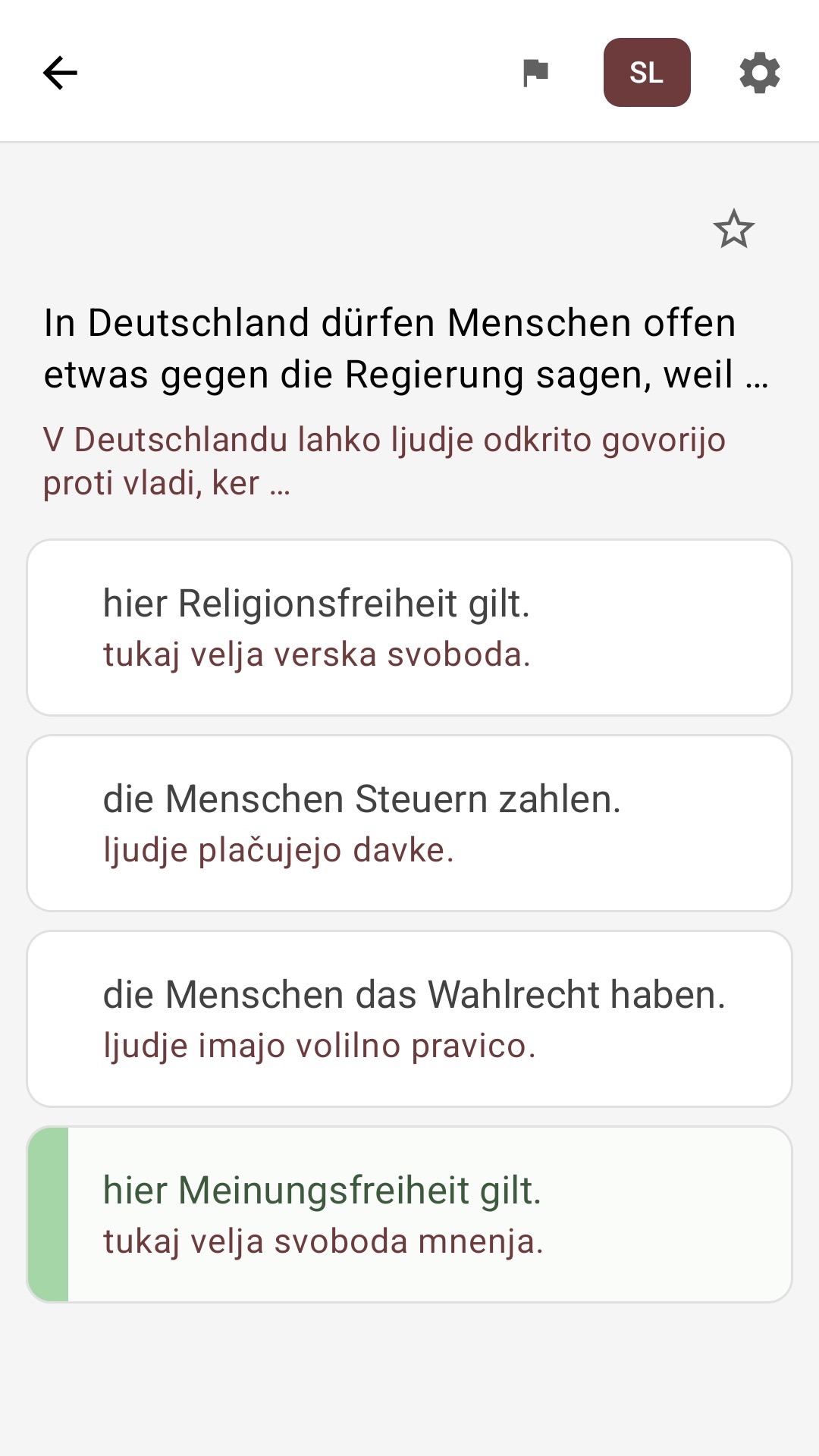 Zaslon z vprašanjem in odgovori, prevedenimi v slovenščino